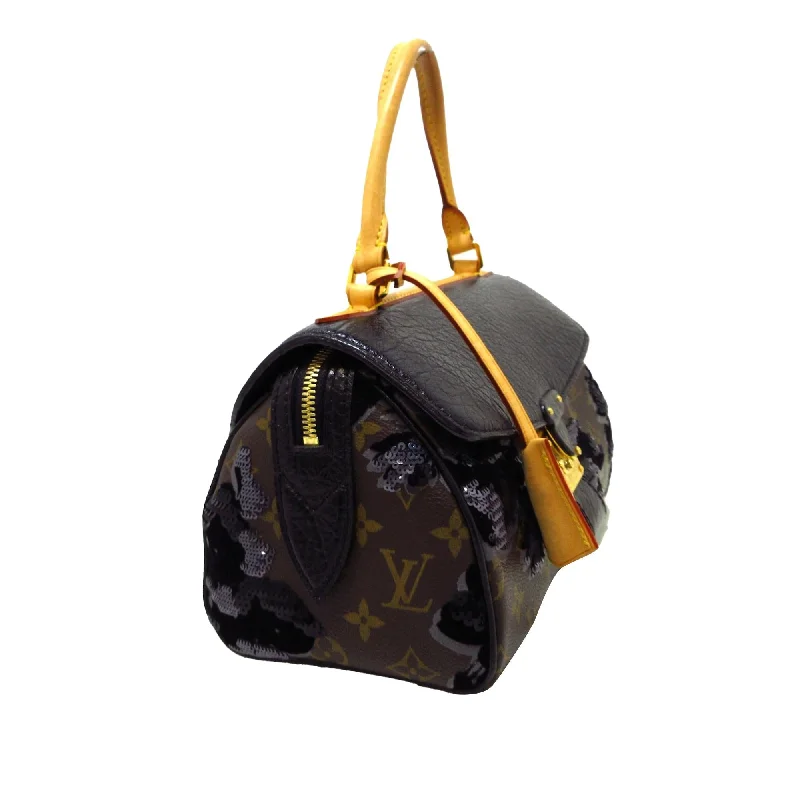 Louis Vuitton backpacks with a hidden back pocket for securityLouis Vuitton Monogram Fleur de Jais Carrousel (SHG-Aae9Dx)