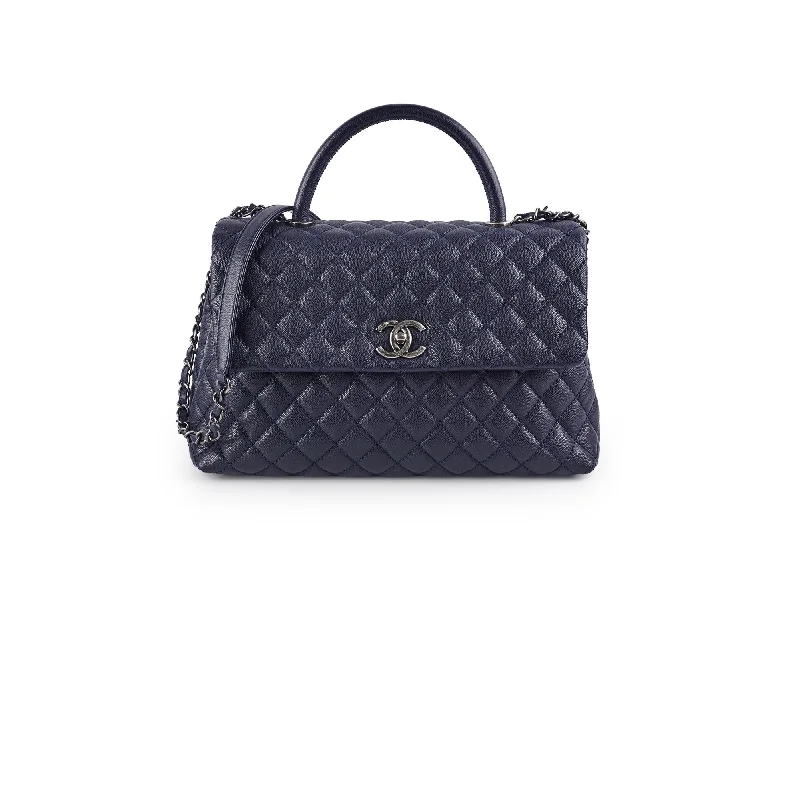 Chanel leather bags for everydChanel Caviar Large Coco Handle Navy 21series