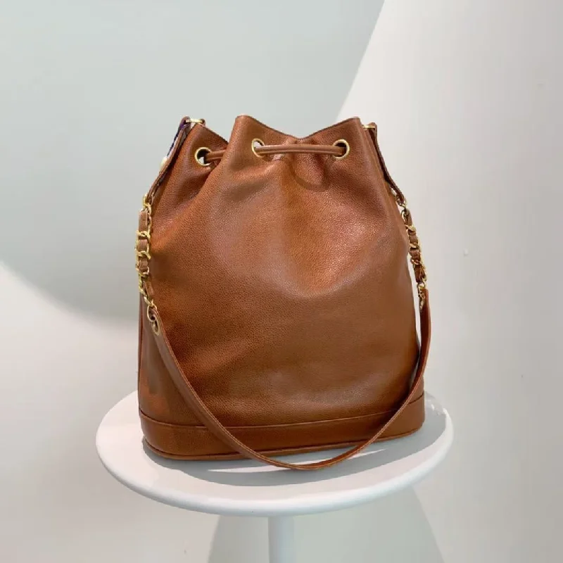 Chanel bags as wedding day accessoriesChanel Vintage Brown Leather Drawstring Shoulder Bag 1994-1996