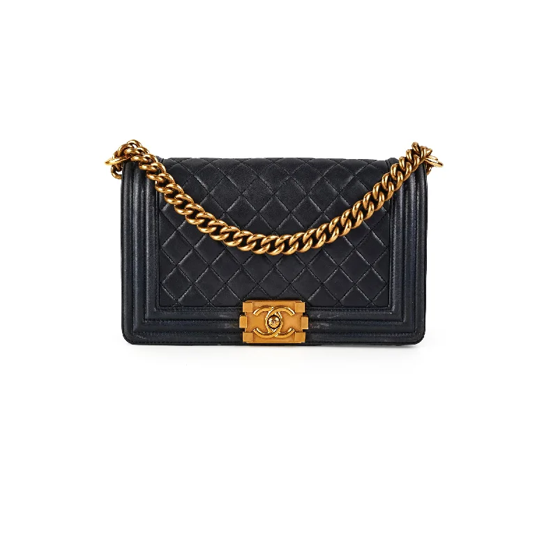 Chanel bags as wedding day accessoriesChanel Old Medium Boy Navy Blue