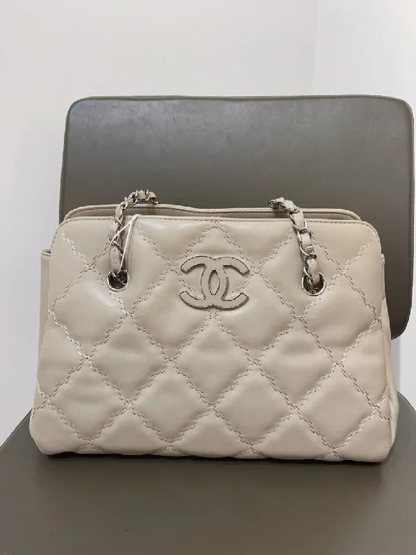 Chanel bags for those who value investment piecesChanel Beige Quilted Leather Chain Tote Bag Medium