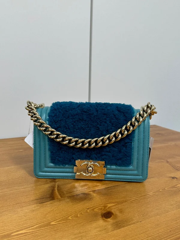 Chanel bags with iconic stitching detailsCHANEL Calf×Mouton Blue G Boy Chanel 20 B09123CSGB