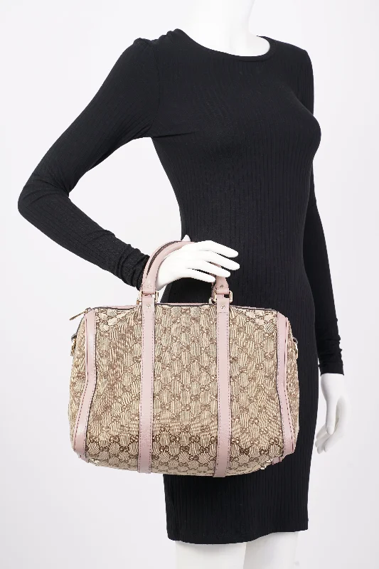 Gucci Marmont bags for women with a contrast - colored interiorGucci Womens Boston Bag Supreme / Pink Canvas Medium