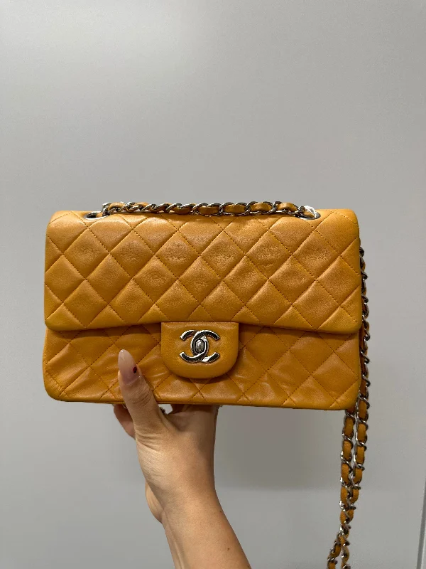 Chanel bags with iconic gold chainsCHANEL Lamb Orange SV Matelasse 23 W Flap B0928GDPF5