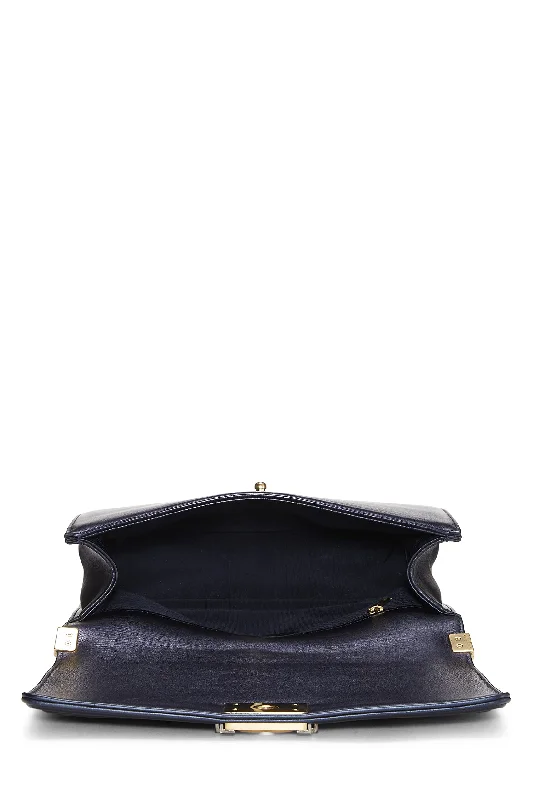 Chanel bags with leather and tweed combinationsChanel,  Navy Cube Embossed Calfskin Boy Bag Large, Navy