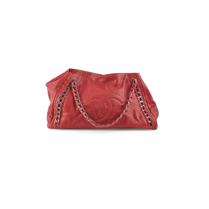 Chanel bags in luxury boutiques worldwideChanel CC Chain Leather Tote Red