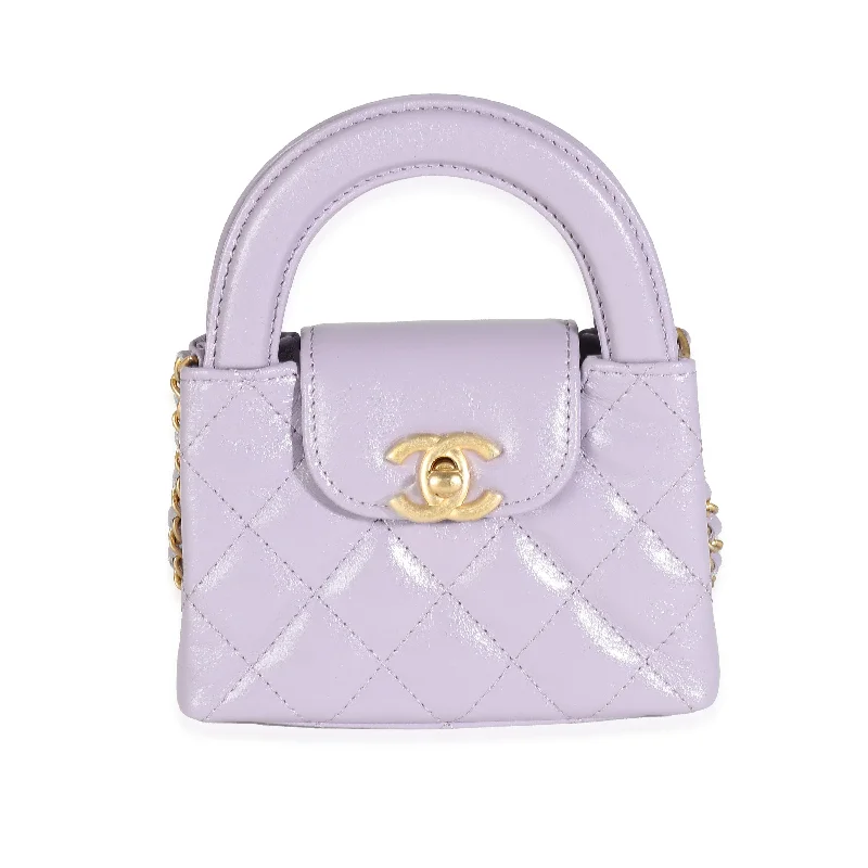 Chanel bags with gold, silver, and pearl accents24P Light Purple Quilted Shiny Aged Calfskin Mini Nano Kelly Shopper