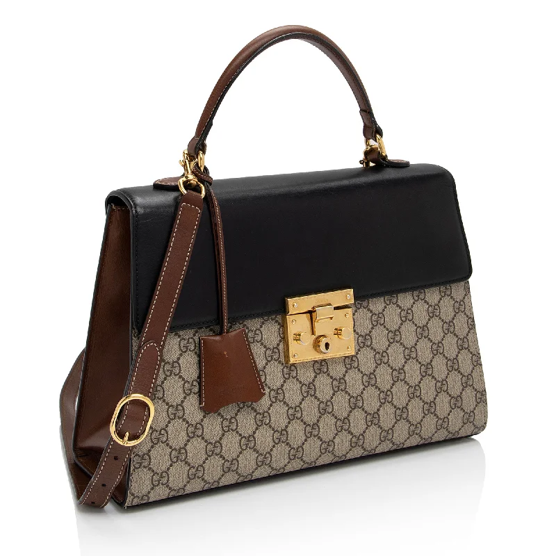 Women Gucci bags with a snap - button closure and a decorative charmGucci GG Supreme Padlock Medium Top Handle (CJW6VB)