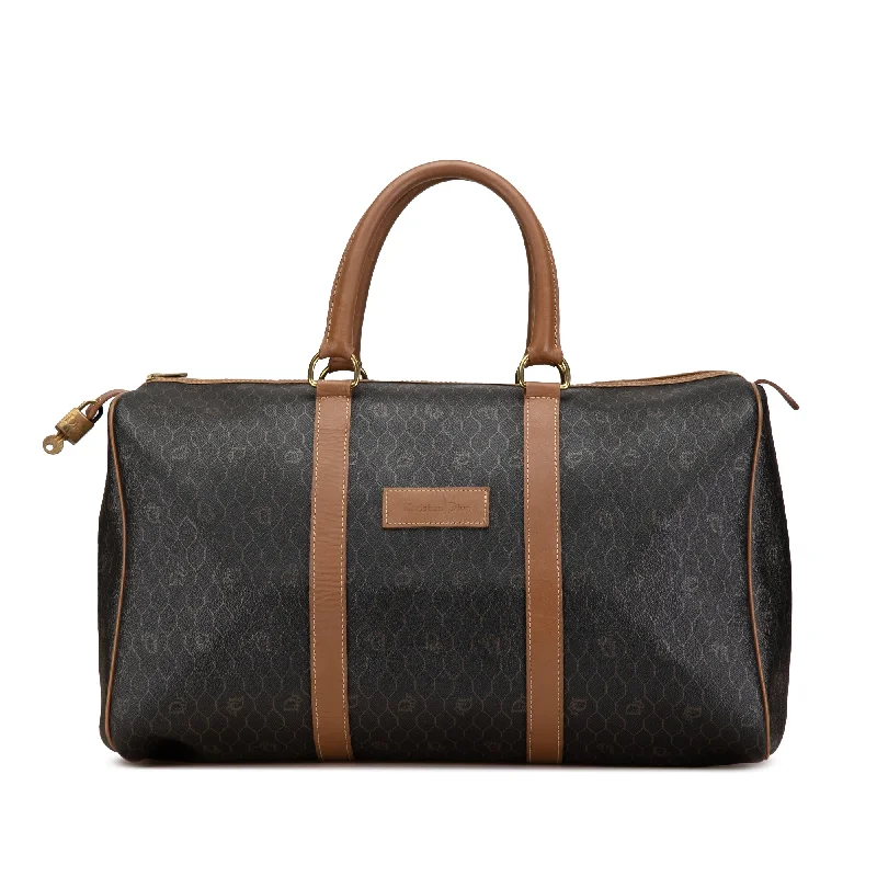 High - fashion Christian Dior bags with a geometric patternBlack Dior Honeycomb Travel Bag