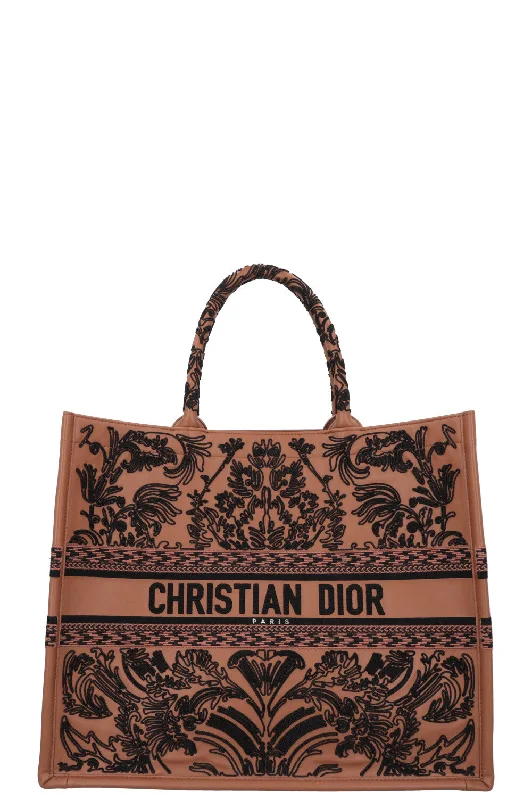 Christian Dior tote bags with a printed Dior logo on the frontCHRISTIAN DIOR Large Book Tote Leather Brown Black