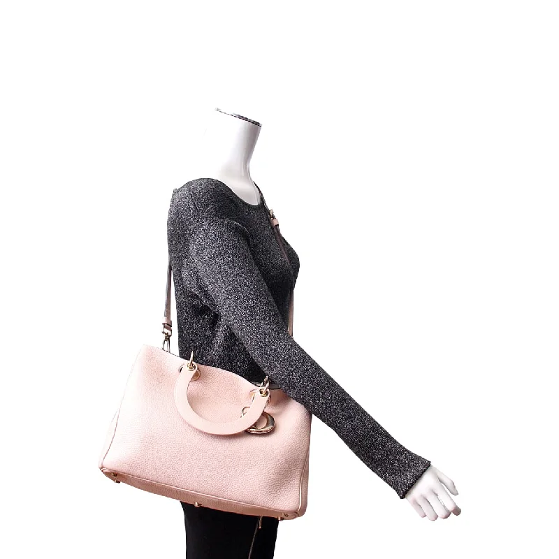 Christian Dior bags with a side - pocket for holding a water bottleCHRISTIAN DIOR Leather Medium Diorissimo Tote Pink