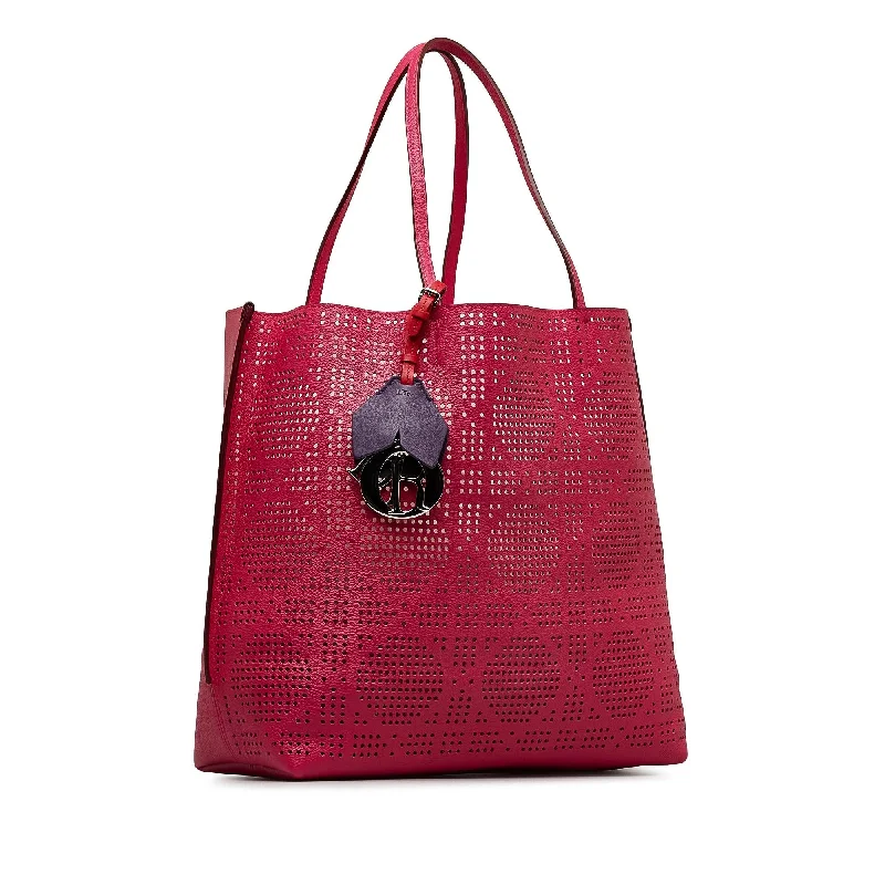 Christian Dior backpacks with a sleek, minimalist silhouetteDior Perforated Cannage Dioriva Tote (B6R2WX)