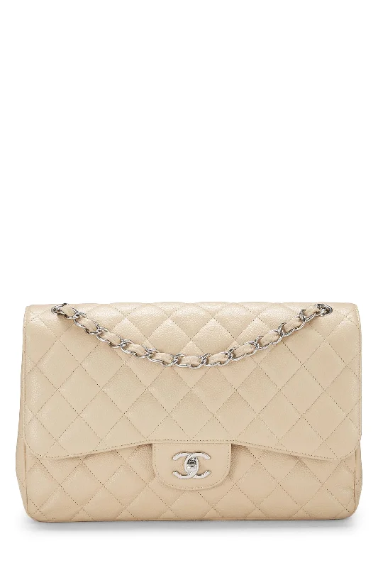 Chanel bags for the minimalist fashionChanel,  Beige Quilted Caviar New Classic Double Flap Jumbo, Beige